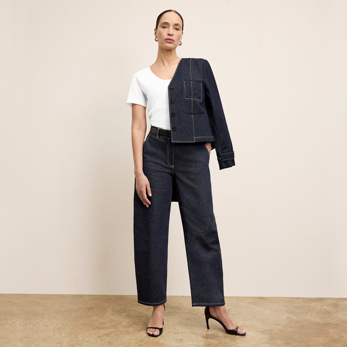 front image of a woman wearing the ayla jacket in midnight wash