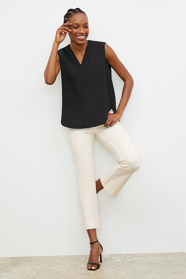 Front image of a woman wearing the Emmy Top in Black | Exclude