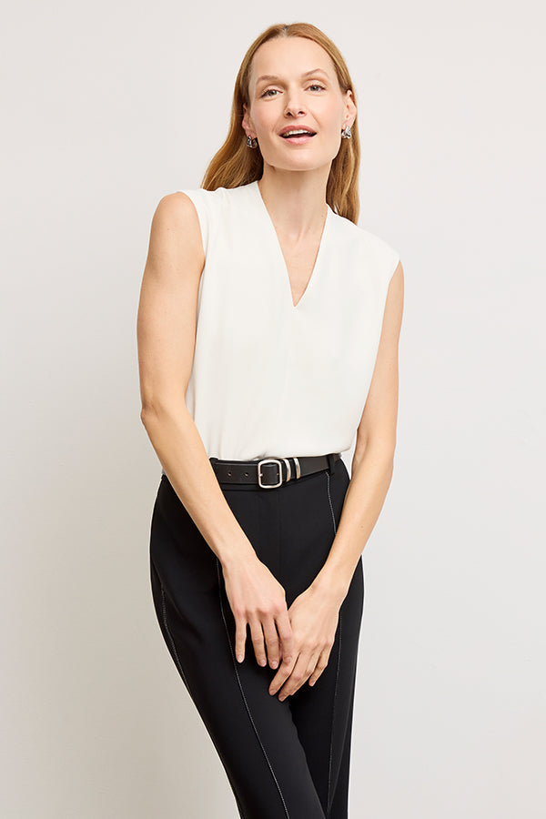 Front image of a woman wearing the Emmy Top in Alabaster | Exclude | Grid Hover