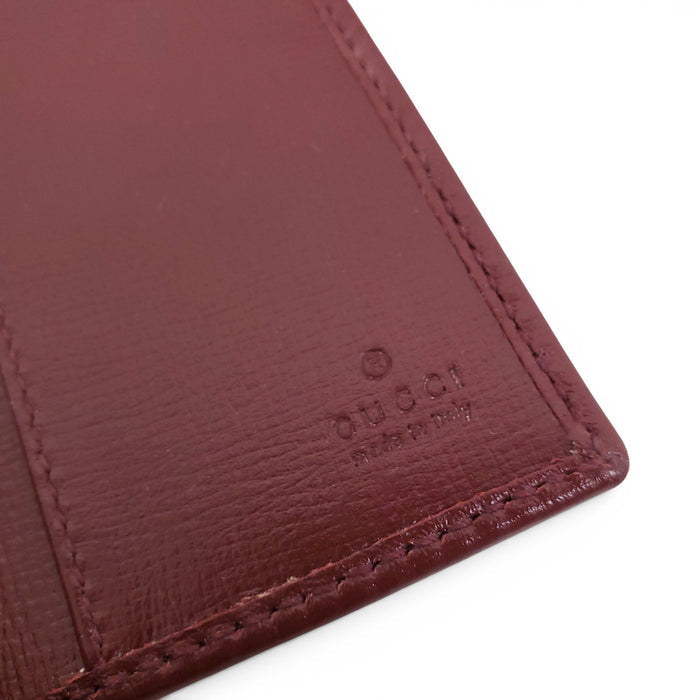 GUCCI GG SUPREME MONOGRAM PASSPORT CASE