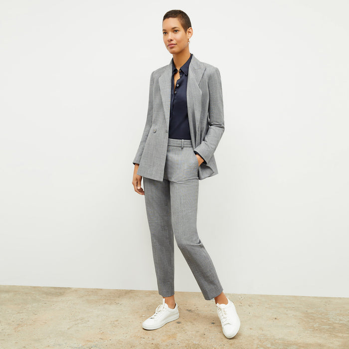 Front image of a woman wearing the Mejia Pant in Black and White Sharkskin