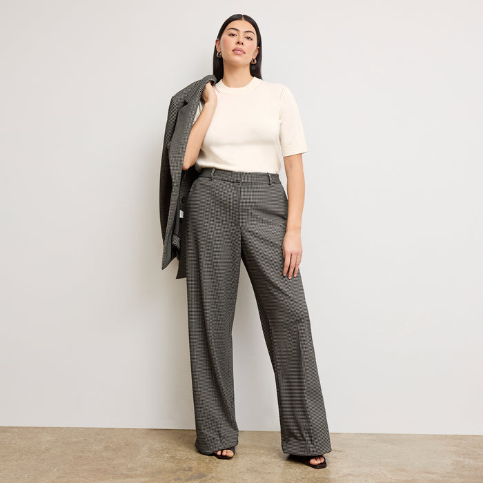 front image of a woman wearing the Tinsley Trousers in Classic Check