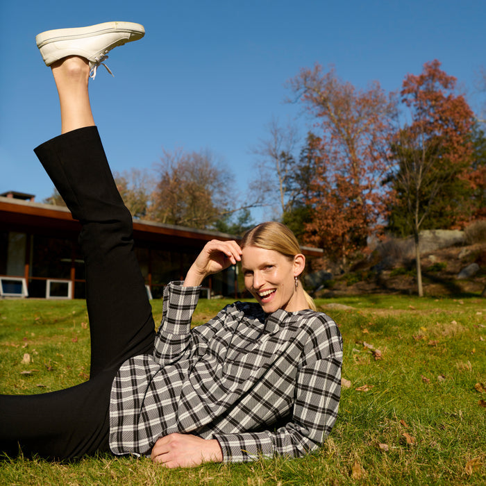 front image of a woman wearing the tully top in checkmate