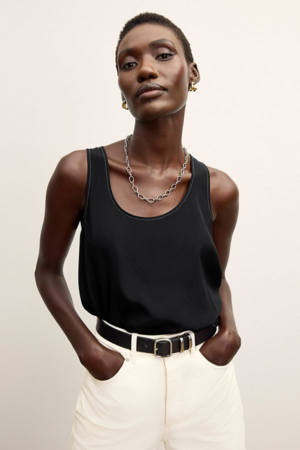 front image of a woman wearing the vicky tank in black | Exclude | Grid