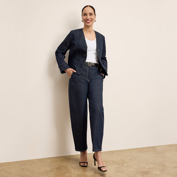 front image of a woman wearing the ayla jacket in midnight wash