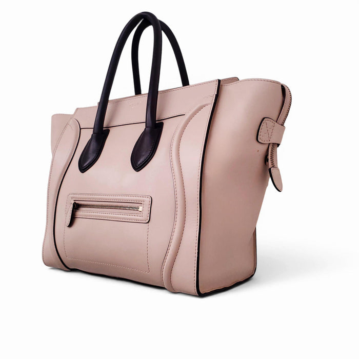 CELINE NUDE AND BLACK LUGGAGE BAG