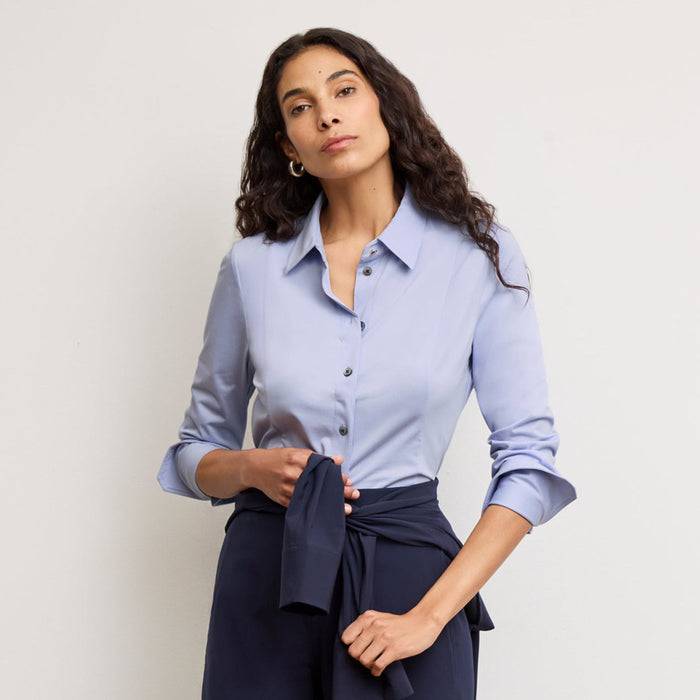 Front image of a woman wearing the Clemens Top in Hydrangea | Lead
