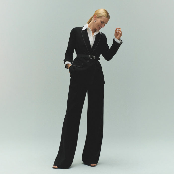 front image of a woman wearing the o'hara jacket in black with topstitch