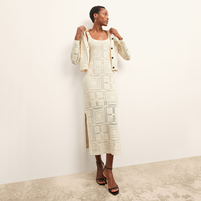 front image of a woman wearing the fina dress in natural