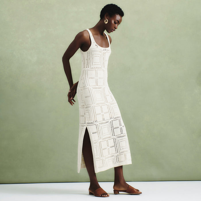 front image of a woman wearing the fina dress in natural