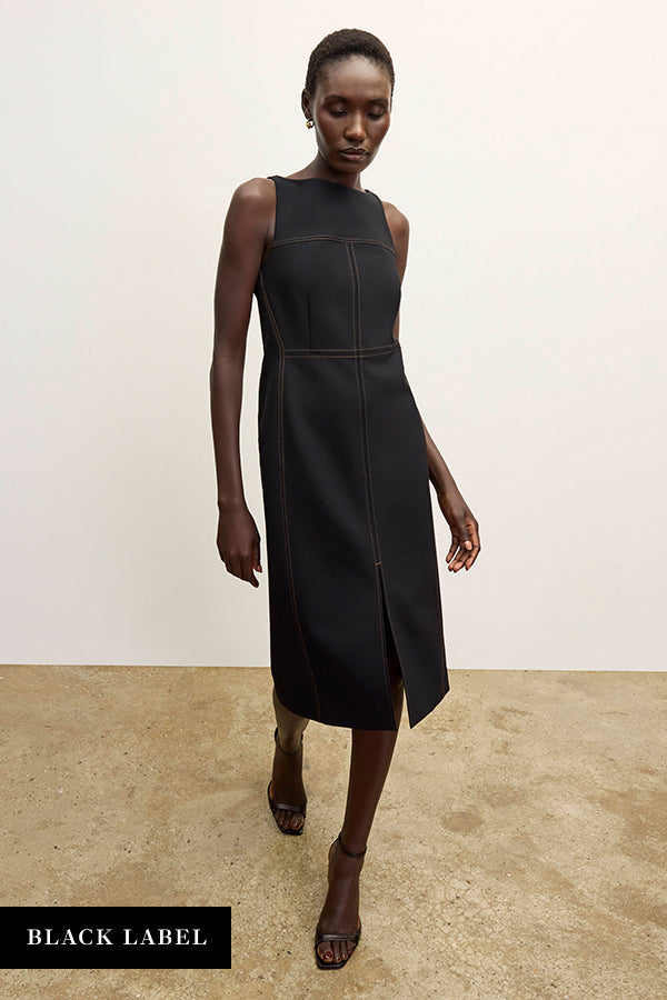 front image of a woman wearing the issa dress in black/light saddle | Exclude | Grid