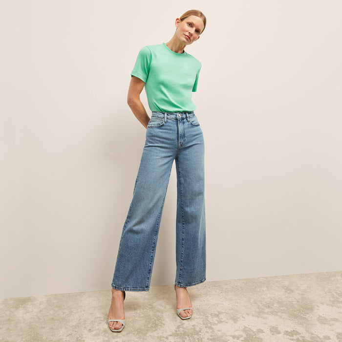 front image of a woman weairng the New York Liberty Leslie T-Shirt in Seafoam