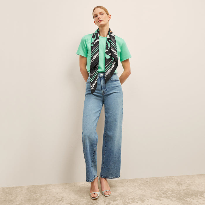 front image of a woman weairng the New York Liberty Leslie T-Shirt in Seafoam