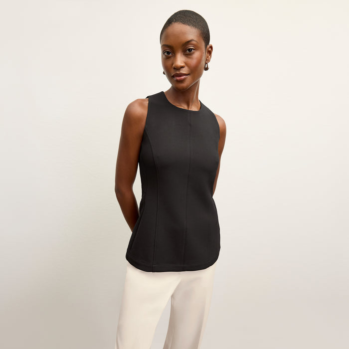 front image of a woman wearing the lucia top in black | Lead