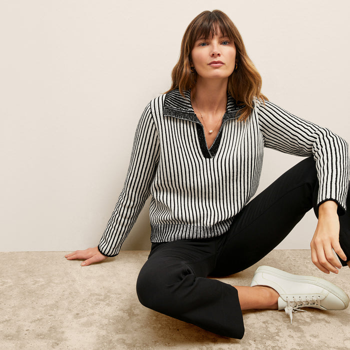 front image of a woman wearing the maja sweater in black/ivory | Lead