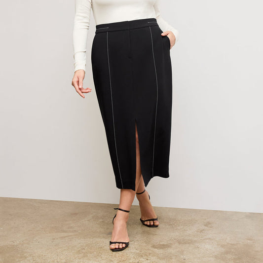 front image of a woman wearing the meghan skirt in black with topstitch | Lead