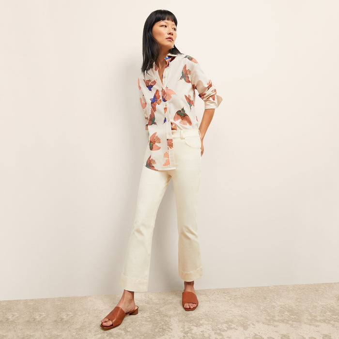 front image of a woman wearing the mila top in hummingbird print | Lead