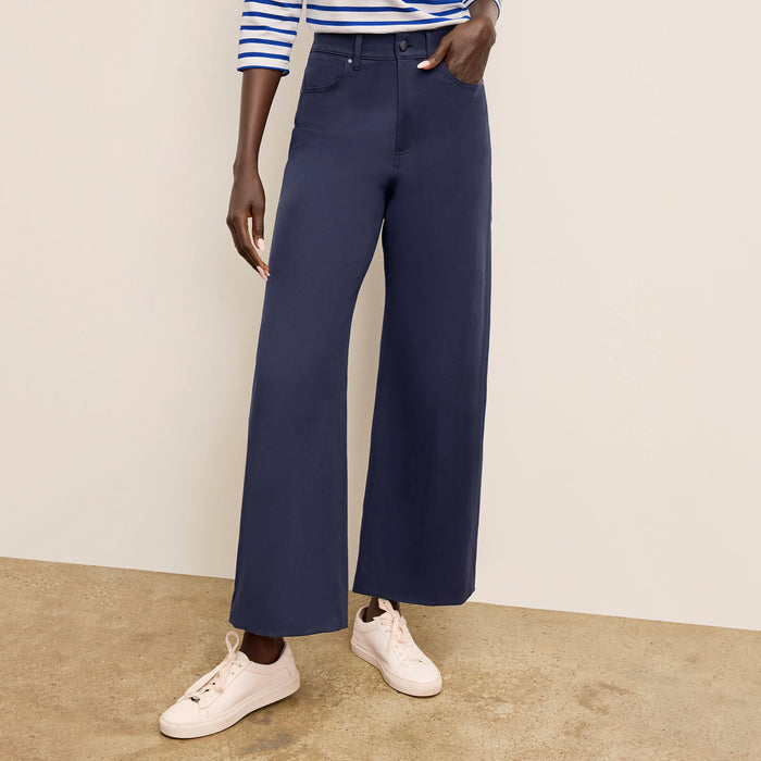 Front image of a woman standing wearing the Milo Jean in ink