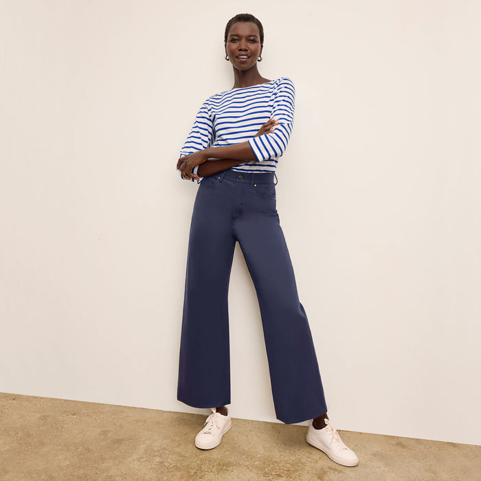 Front image of a woman standing wearing the Milo Jean in ink