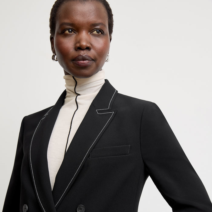 front image of a woman wearing the natasha top in cloud jersey