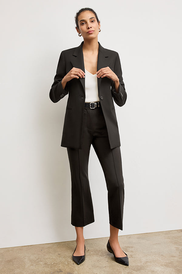 front image of a woman wearing the rossi blazer in black | Exclude