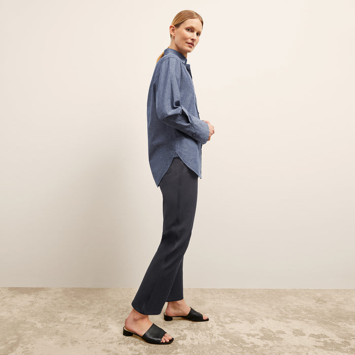 side image of a woman wearing the siobhan top in clear blue
