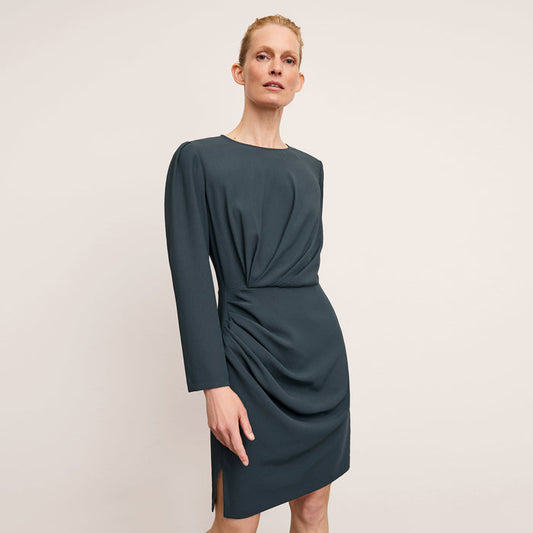 front image of a woman wearing the wallen dress in ocean | Lead