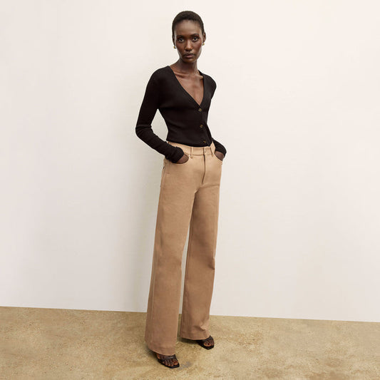 front image of a woman wearing the watson cardigan in black | Lead
