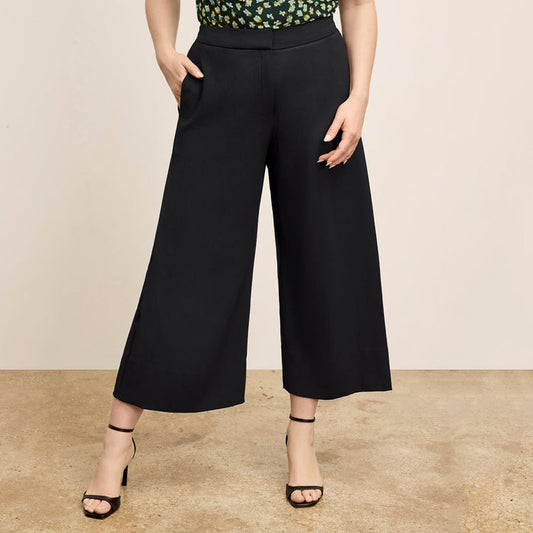 Front image of a woman wearing the Zhou Culotte - Eco Soft Wave :: Black | Lead